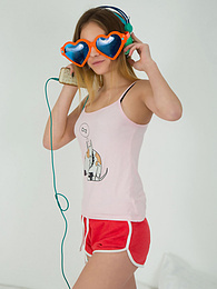 Find-Best-Lingerie.com presents: This doll really knows how to have fun with her and how she can show off her pussy and listen to some beats at the same time.