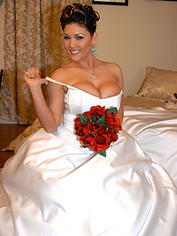 Find-Best-Lingerie.com presents: Horny bride Claire Dames enjoys licking her big tits and fingering her pussy
