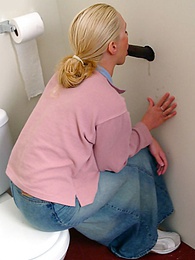 Find-Best-Lingerie.com presents: Blonde girl Jamie sits on the toilet and blows a black gloryhole dong
